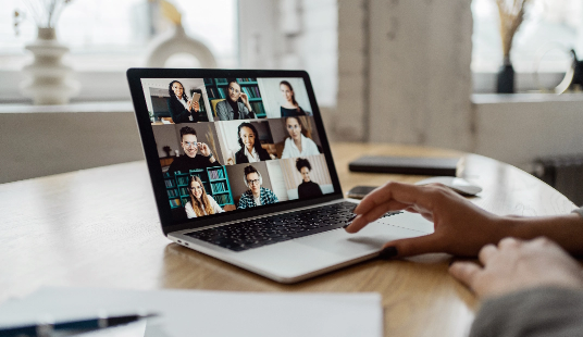 video-communication-woman-with-colleagues-freelancer-workplace-uses-laptop-computer-company-report